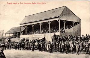 IMLAY CITY, MICHIGAN - FULL GRAND STANDS AT FAIR GROUNDS - 1908 OLD POSTCARD - Picture 1 of 2