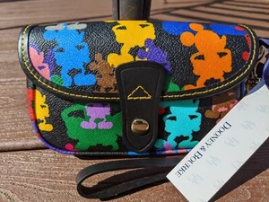 Muñequera Dooney & Bourke Disney Wonder 🐭 Mickey Mouse 🌈 Silueta Solapa - Imagen 1 de 7