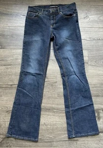 Pantalones de mezclilla para mujer Bebe corte bota elásticos desgastados azul oscuro talla 31 X 32 - Imagen 1 de 11