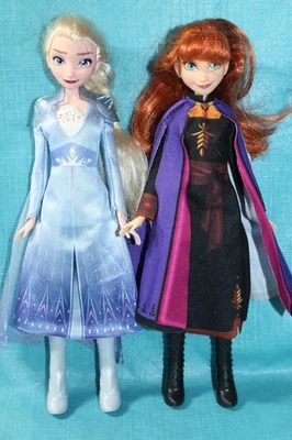 DISNEY PUPPE K23 ANNA und ELSA DIE EISKÖNIGIN 29 cm FIGUREN PRINZESSIN SCHWESTER - Bild 1 von 3