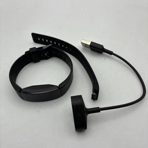 Fitbit Inspire HR Fitnesstracker - Schwarz mit Ladegerät und extra Band (Größe L) 022 - Bild 1 von 3