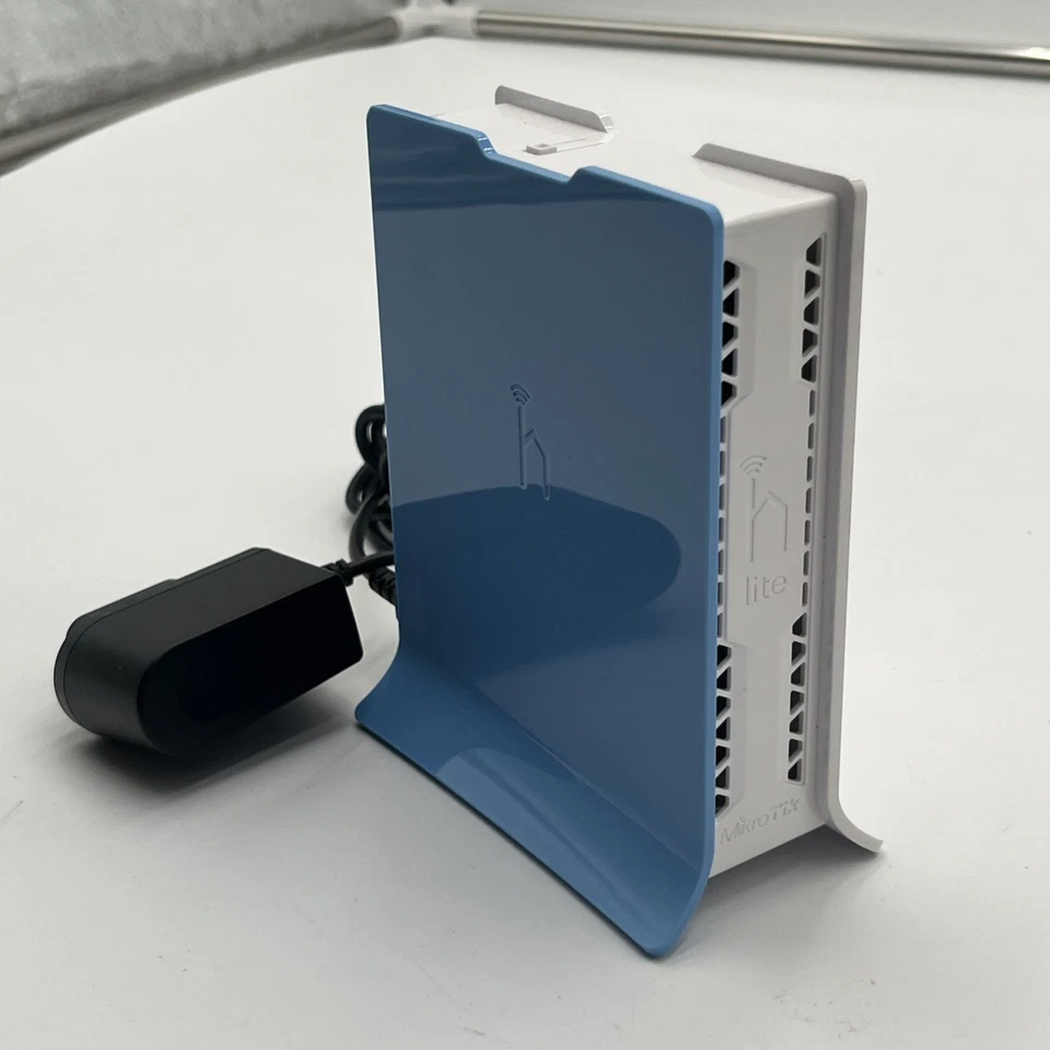 Mikrotik hAP Lite Tower Routerboard RB941-2nD-TC Wireless N 4xPort Router - Image 1 of 4