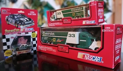 1994 Racing Champions 1:64, Harry Gant #33 Chevrolet (2) transporters + car - Image 1 of 2