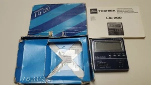 VINTAGE RARE TOSHIBA LQ 200 TRAVEL ALARM CLOCK WITH INSTRUCTIONS - Picture 1 of 3