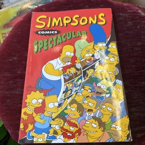 Titan Books: SIMPSONS COMICS SPECTACULAR  Bart, Homer, Lisa, Marge, Bongo Comics - Imagen 1 de 2