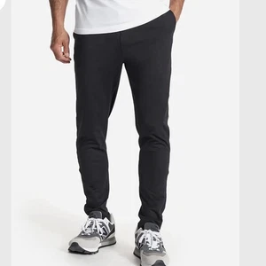 Pantalones de correr elásticos negros VUORI V454 M Sunday Performance para hombre - Imagen 1 de 12