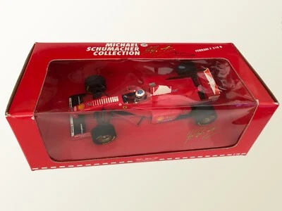 MINICHAMPS 1997 Ferrari F310B Michael Schumacher 1:18th Scale Model. - Image 1 of 3