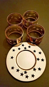 8 versilberte leuchtende Sterne Serviettenringe und Untersetzer Vintage - Bild 1 von 1