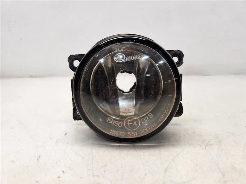 Luz antiniebla izquierda para conductores Nissan Frontier 2005-09 (doble cabina) - sin parachoques cromado Foto 1 de 4