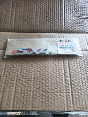 Parrilla delantera Suzuki Grand Vitara SX4 2006-2013 cromo emblema S 77811-65J00-0PG Foto 1 de 4