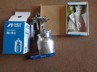 Pistola pulverizadora anest iwata w200 con configuración 1.5 y 1.8 Foto 1 de 4