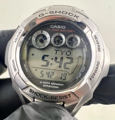 Reloj digital Casio G-Shock G-7100D de acero inoxidable 200M WR hora mundial Foto 1 de 4