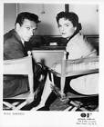 Dane Clark and Mercedes McCambridge sitting in director chairs f - 1956 Photo