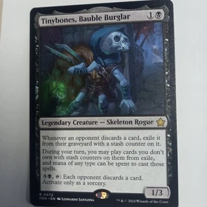 MTG ~ Tinybones, Bauble Burglar (Foil) ~ Foundations ~ Near Mint ~ Rare - Bild 1 von 1