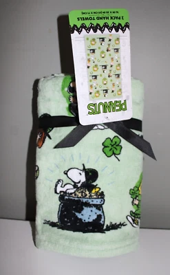 NWT Rae Dunn Peanuts St. Patrick's Snoopy Charlie Brown Sally Green Hand Towels - Image 1 of 4