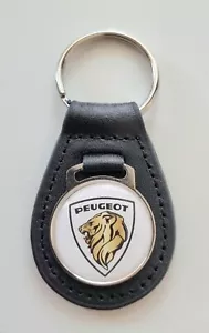 Peugeot Keyring Logo White Gold on Leather - Dimensions Emblem 29mm - Picture 1 of 1