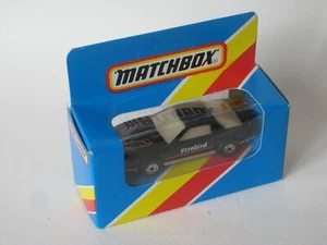 Matchbox Pontiac Firebird SE Glow Window Black Body 75mm Toy Model Car Boxed - Picture 1 of 5