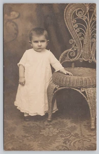 Child Baby Portrait Standing Next To Chair Real Photo Postcard RPPC - Picture 1 of 2