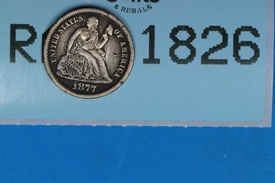 Moneda de diez centavos de plata libertad sentada 1877-CC 10C tipo temprano de Estados Unidos RAW-1826 Foto 1 de 2
