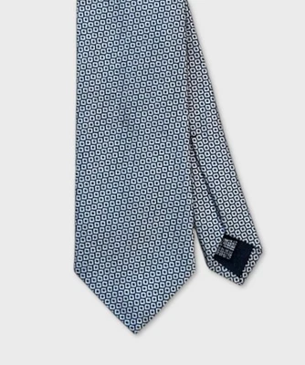 Villa Milano cravatta tre pieghe in seta fantasia geometrica, argento blu CR3.95 - Immagine 1 di 2