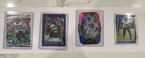 Rashod Batemen, Fred Taylor, Alijah Vera-Tucker, and Ty Johnson Cards 