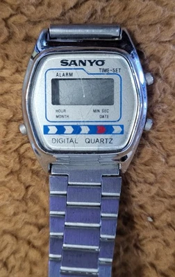 Reloj Sanyo Vintage Retro Años 80 Cuartos de Acero Inoxidable (Falta Cubierta Trasera) Foto 1 de 4
