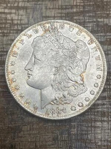 1884-O $1 US Morgan Silver Dollar - Picture 1 of 2