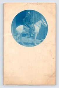 RPPC 1907. BLUE TINT, MAN ON HORSEBACK. POSTCARD SC38 - Picture 1 of 2