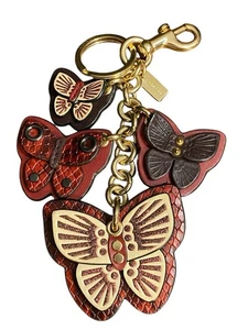 Coach Multi Schmetterling Charms Cluster Weinrot/Burgund Gold Schlüsselanhänger #72975 Neu ohne Etikett - Bild 1 von 4