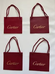 Bolsas de regalo Cartier texturizadas Borgoña Petite 7 x 7 7/8 pulgadas Juego de cuatro - Imagen 1 de 15