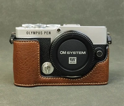 Media funda protectora de cuero PU antideslizante para OLYMPUS PEN E-P7 Foto 1 de 4