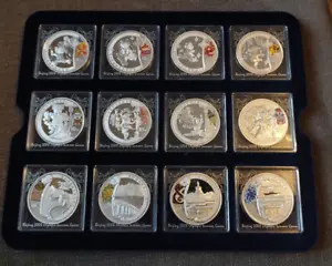 10 yuan Beijing olympic summer games - 12 silver coins - Picture 1 of 3