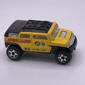 2009 Hot Wheels Rockster: Race World Beach ‘10, Yellow Lifeguard, 180/240 - Picture 1 of 3