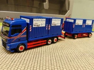 1/87 Herpa MAN Blome SLH Flachbett HZ mit Ladekran und 4x 10ft. Container - Bild 1 von 2