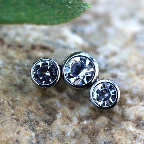 Tapa dérmica triple circonita cúbica transparente de acero inoxidable 316L Foto 1 de 3