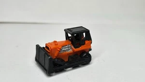 Mini vehículo de construcción vintage Galoob Micro Machines Orange Bulldozer 1987 - Imagen 1 de 6