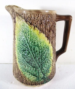 19TH C MAJOLICA 8 1/2" H PITCHER, LARGE LEAF PATTERN ON BARK TEXTURE BACKGROUND - Picture 1 of 6