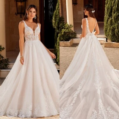 Luxury A-Line Wedding Dresses V-Neck Spaghetti Straps Lace Applique Bridal Gowns - Image 1 of 4