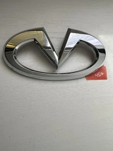 NEW NISSAN INFINITI Genuine Q70 Q70L Front Emblem 62890-4AM0A - Picture 1 of 4