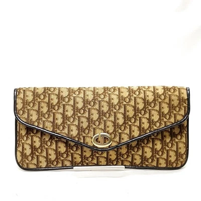 Bolso clutch Christian Dior de lona marrón 4493218 SIN TARIFA Foto 1 de 4