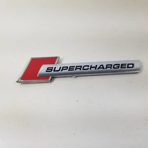 2016-2018 AUDI A7 FRONT RIGHT OR LEFT FENDER SUPERCHARGED EMBLEM OEM - Picture 1 of 13