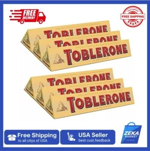 NEW TOBLERONE SWISS MILK CHOCOLATE - HONEY AND ALMOND NOUGAT, 6 X 100 G BARS - Picture 1 of 8