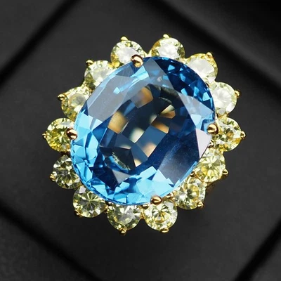 Brillantes anillos enchapados en oro de 24 quilates de plata de ley 925 de 13,11 quilates con topacio azul de Londres Foto 1 de 4