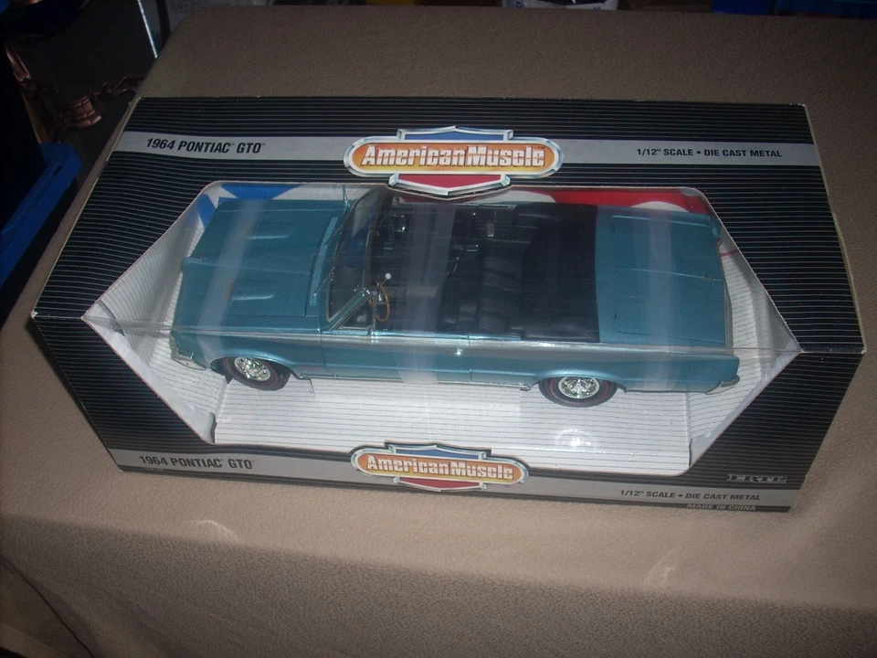 AMERICAN MUSCLE '64 PONTIAC GTO, FUNDIDO A PRESIÓN 1/12, SELLADO, ¡RARO!! Foto 1 de 4