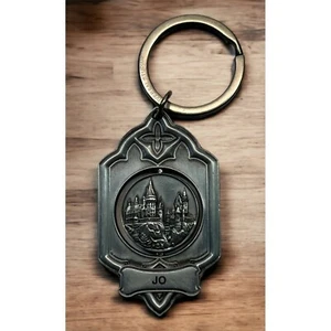 Harry Potter Llavero Mundo del Mago Universal Studios "Jo" Giratorio - Imagen 1 de 7