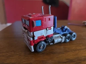Hasbro Takara Tomy Premium Finish SS-02 Optimus Prime Actionfigur einige Teile M - Bild 1 von 4