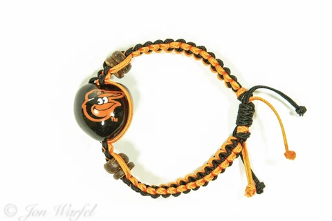 Baltimore Orioles Go Nuts Kukui Nut Macrame Bracelet (MLB Officially Licensed) Cover