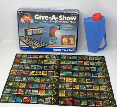 Proyector Give A Show Care Bears 1984 Kenner con 16 tiras de película y luz de trabajo Foto 1 de 4