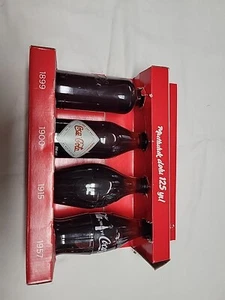 Coca Cola Turkey 125 Year Celebration 4 Bottle Display 250ml 1899 1900 1915 1957 - Picture 1 of 10