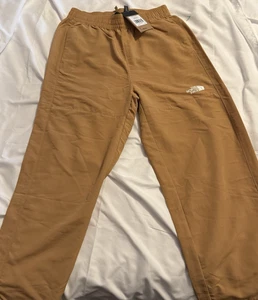 Pantalones fáciles de nailon TNF para mujer The North Face en mantequilla de almendras talla mediana - Imagen 1 de 10